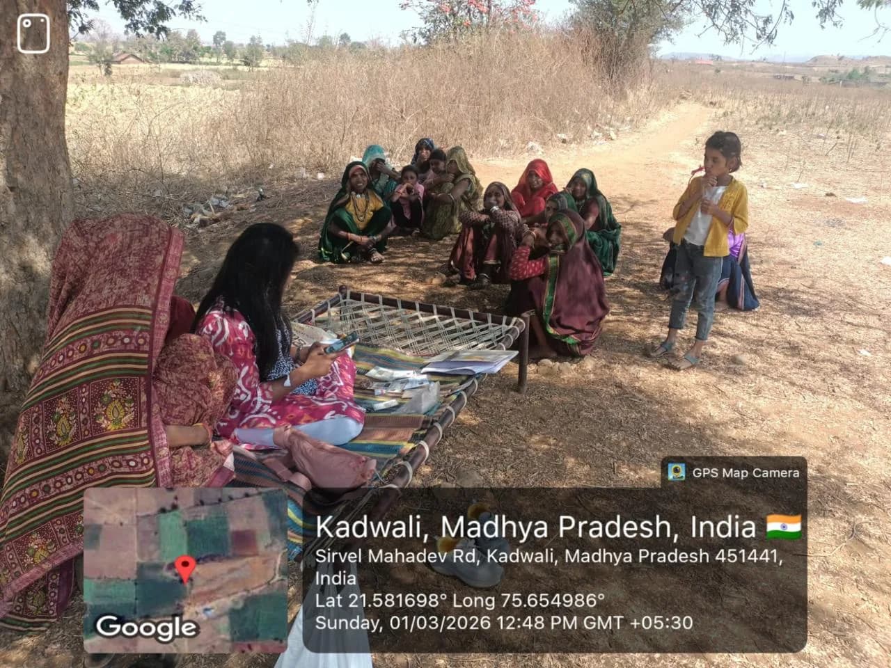 Community meeting with women from the village