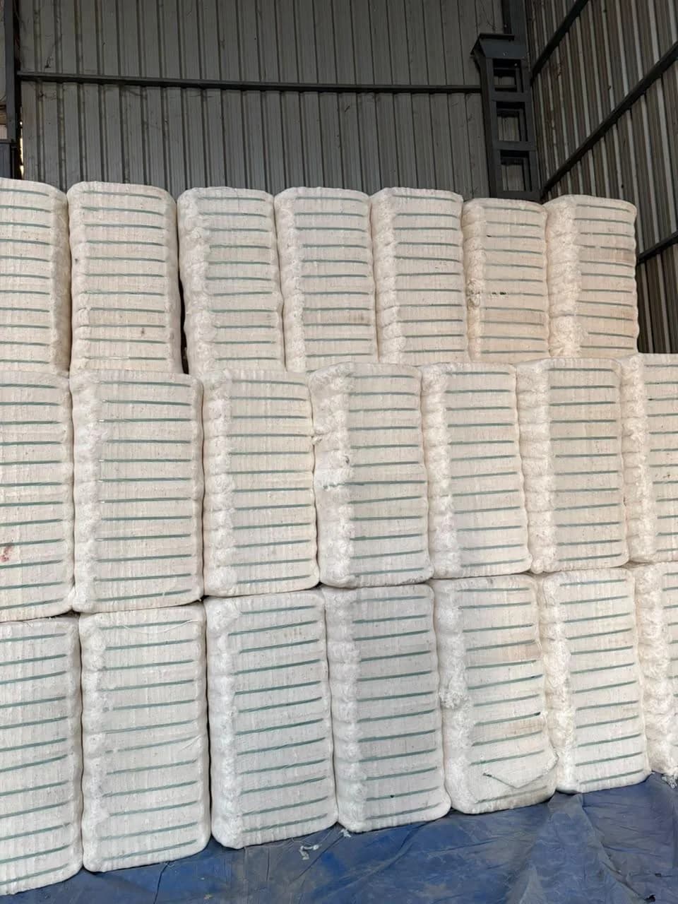 Stacked pressed cotton bales